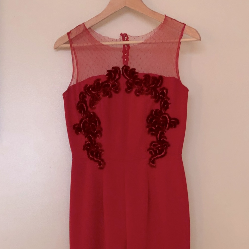 Incredible one of a kind red jumpsuit. Fits like a glove